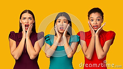 Three Discontented Girls Screaming Standing On Yellow Studio Background, Panorama Stock Photo