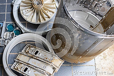 Disassemble the laundry washing machine parts to clean and clear the washer drum,removes mold,algae stains and dirt inside the Stock Photo