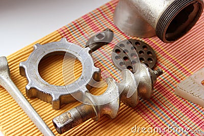 Disassembled meat grinder. Cast iron meat grinder Stock Photo
