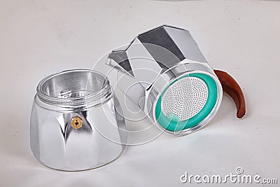 Disassembled metallic geyser coffee pot, coffee maker isolated Stock Photo
