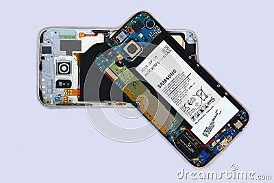 A disassembled Samsung cellphone Editorial Stock Photo