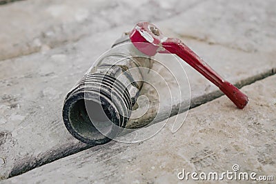 Disassembled water faucet on a white background Stock Photo