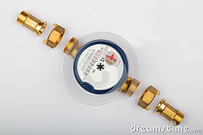 Disassembled water meter with details for measures the quantity and volume of water that passes through a pipe. Plumbing tool Stock Photo
