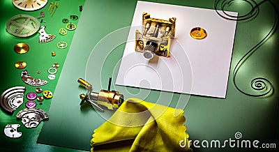 Disassembled wristwatch awaiting repair by watchmaker Stock Photo