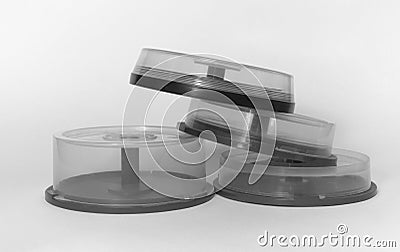 Disc cake box. pile of transparent storages with spindel for CDs Stock Photo