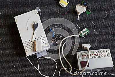 Discarded electronic devices and cables Stock Photo