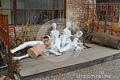 Discarded nude mannequins in junkyard. Stock Photo