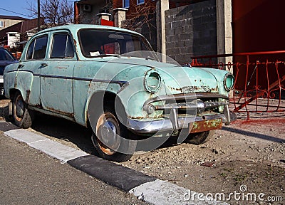 Discarded old grungy car Stock Photo