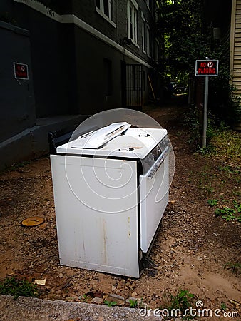 Grungy Old Oven / Stove Abandoned by Urban Steet. Can be used as Background. Stock Photo