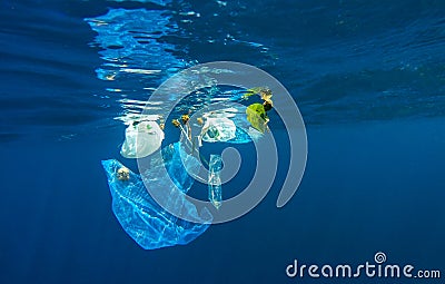 Discarded plastic in ocean Stock Photo