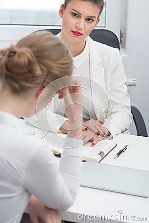 Disciplinary conversation with employee Stock Photo