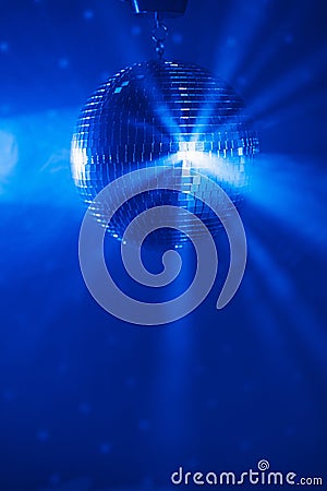 disco ball background with blue shiny rays Stock Photo