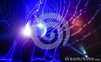 Disco ball laser show in modern disco party night club Stock Photo