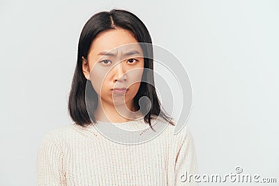 Discontent female curving her lips, grumpy angry Stock Photo