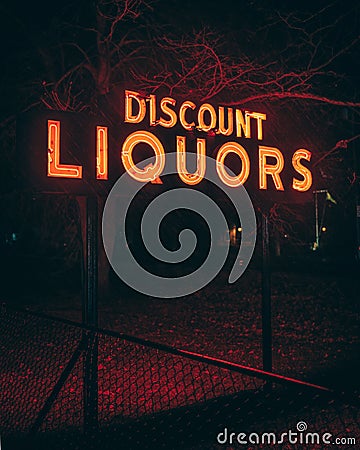 Discount liquors neon sign at night, Amagansett, New York Editorial Stock Photo
