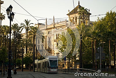 The tram slowly passes through the city center of Seville, Spain Editorial Stock Photo