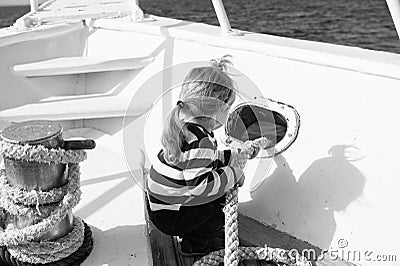 Discovery concept. Little child enjoy sea travel on ship, discovery. New discovery. Launch out on a voyage of discovery Stock Photo