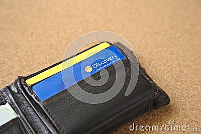 Discovery medical aid card inside a wallet. Health insurance in South Africa concept Editorial Stock Photo