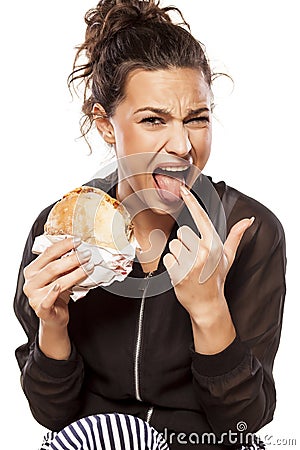 Disgusted by her sandwich Stock Photo