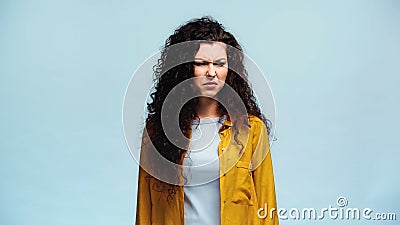 disgusted woman frowning while looking away Stock Photo