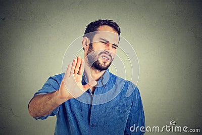 Disgusted young man. Negative human emotion Stock Photo