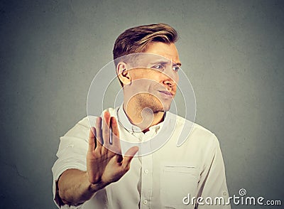 Disgusted young man. Negative human emotion Stock Photo