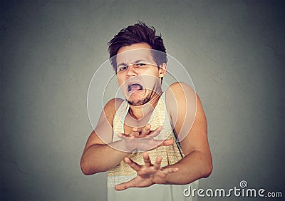 Disgusted young man. Negative human emotion Stock Photo