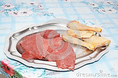 A dish with believed meat, to cook with the barbecue Stock Photo