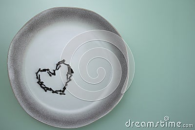 Dish ceramics love clove spice plate Stock Photo