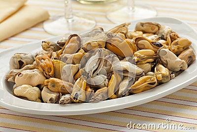 Dish with fresh cooked mussels Stock Photo