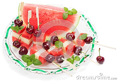 Dish with fresh fruit salad (watermelon, melon, cherries, min Stock Photo