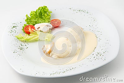 The dish of grilled chicken with cream souse and garnished Stock Photo