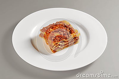 Dish with lasagna portion to meat Stock Photo