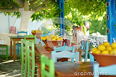 A dish of lemons in typical greek outdoor cafe Stock Photo