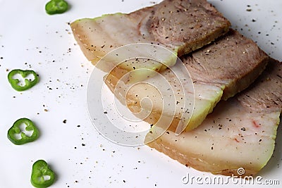 A dish made by boiling pork in water. Stock Photo