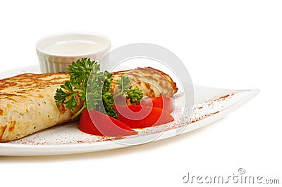 Dish of pancakes with vegetables Stock Photo