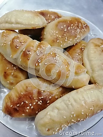 A dish of pastries with sesami seeds Stock Photo