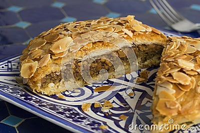 Dish with sliced traditional Moroccan small bastella Stock Photo