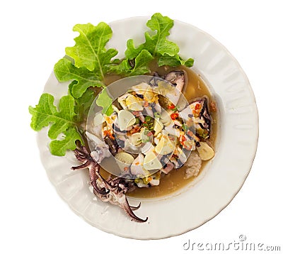 Dish of Steam squid with spicy chilli and lemon sauce Stock Photo