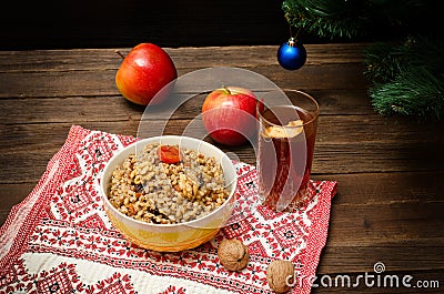 Dish is a traditional Slavic treat on Christmas Eve on a towel. Fruit drink, apples Stock Photo