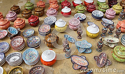 Dishes and containers of colorful glazed ceramic Stock Photo