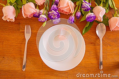 Dishes and roses on special days Stock Photo