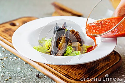 Dishes: Vegetable tomato supper to create a restaurant menu with fine dining cuisine Stock Photo
