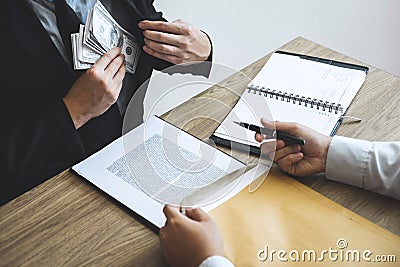 Dishonest cheating in business illegal money, Businessman receive bribe money in business people to give success the deal contract Stock Photo