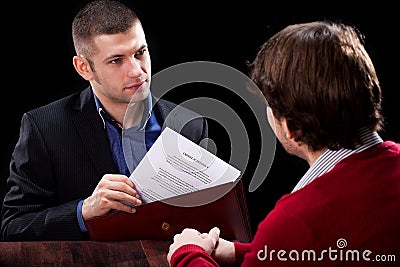 Dishonest insurance agent Stock Photo