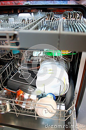 Dishwasher after cleaning process Stock Photo