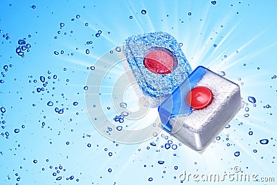 Dishwasher detergent tablet under blue water Stock Photo