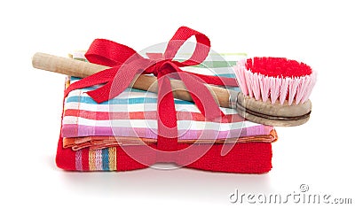 A dishwashing brush on a red towel Stock Photo