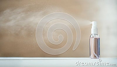 Disinfecting sanitizer bottle alcohol spray diffusing antibacterial sanitiser. Stock Photo