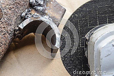 Disk Angle grinder. Tool for working with metal. The working disk. detail, polished by the Bulgarian. Stock Photo
